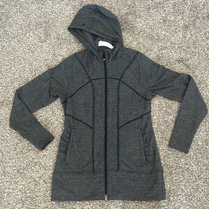 Athleta hooded jacket gorgeous details. Worn once. Thumb holes & zipper pockets.
